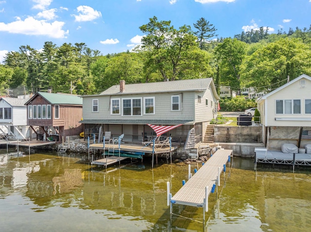 57 Lakeside Rd, Bristol, NH 03222 - dock featuring boat lift and a water view
