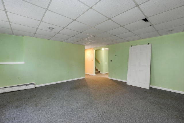 161 Frank C Gilman Hwy, Alton, NH 03809 - carpeted empty room with a drop ceiling, a baseboard heating unit, stairs, and baseboards