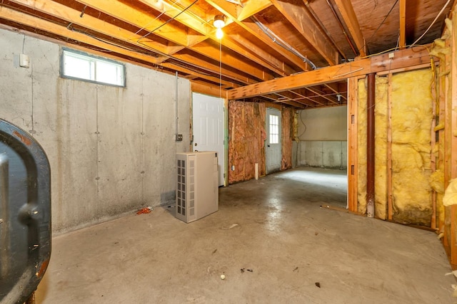 161 Frank C Gilman Hwy, Alton, NH 03809 - below grade area featuring oil tank and healthy amount of natural light