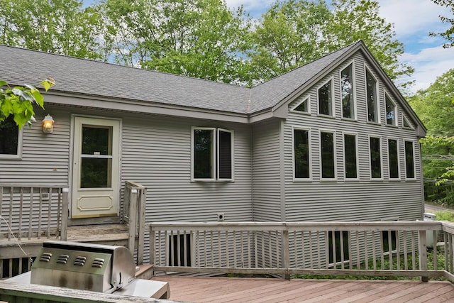 161 Frank C Gilman Hwy, Alton, NH 03809 - rear view of house with a wooden deck and a shingled roof