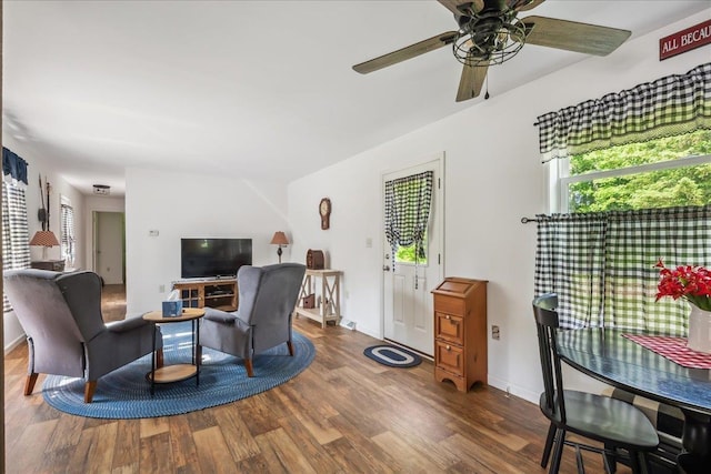4611 W Berkshire Rd, Enosburg, VT 05450 - living area featuring wood finished floors, ceiling fan, and baseboards