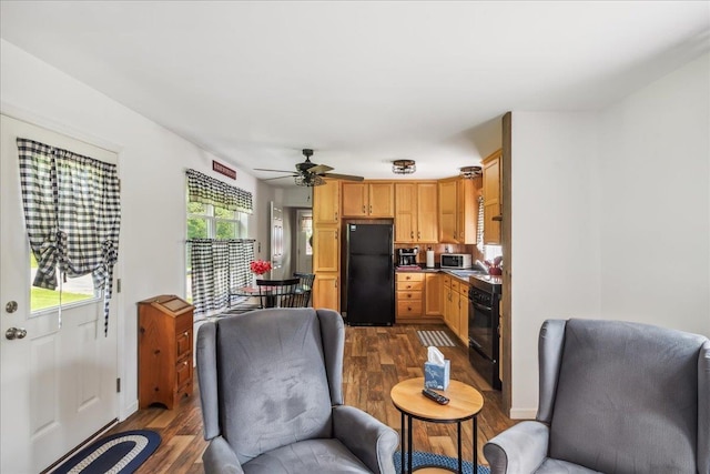 4611 W Berkshire Rd, Enosburg, VT 05450 - kitchen featuring black appliances, dark wood-style flooring, and ceiling fan