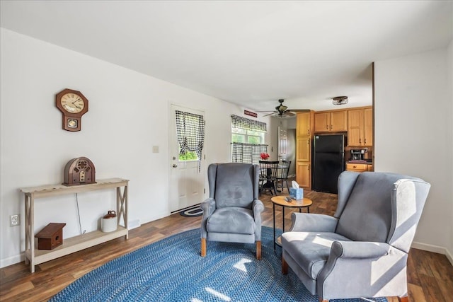 4611 W Berkshire Rd, Enosburg, VT 05450 - living area featuring ceiling fan, dark wood-style flooring, and baseboards
