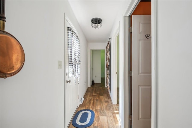 4611 W Berkshire Rd, Enosburg, VT 05450 - corridor featuring wood finished floors