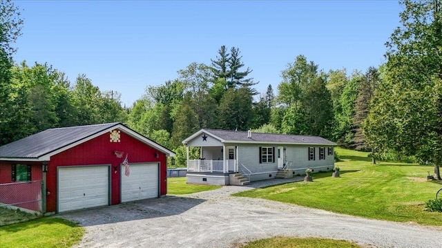 4611 W Berkshire Rd, Enosburg, VT 05450 - ranch-style home featuring covered porch, an outdoor structure, a front lawn, dirt driveway, and a detached garage
