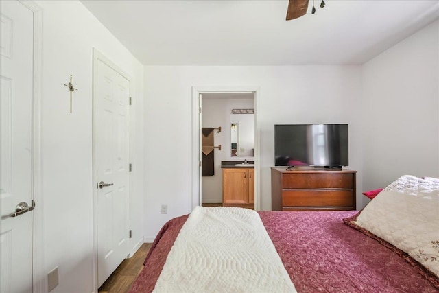 4611 W Berkshire Rd, Enosburg, VT 05450 - bedroom with wood finished floors, ensuite bath, baseboards, and ceiling fan