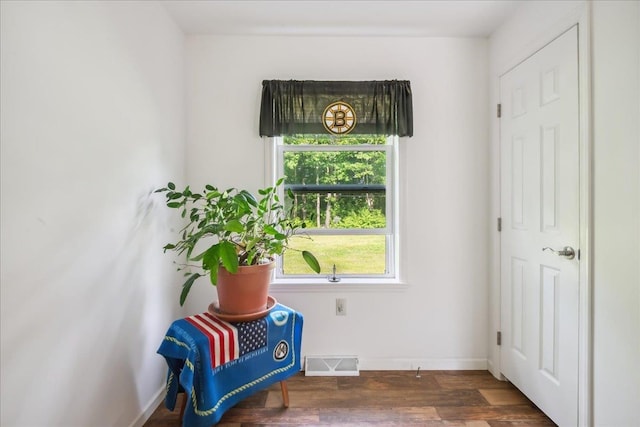 4611 W Berkshire Rd, Enosburg, VT 05450 - living area featuring healthy amount of natural light, wood finished floors, and baseboards