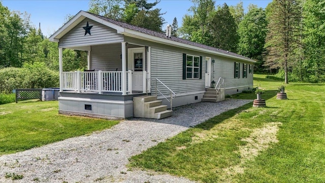 4611 W Berkshire Rd, Enosburg, VT 05450 - manufactured / mobile home with crawl space, a front lawn, and covered porch