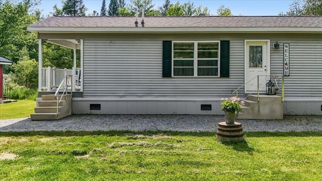 4611 W Berkshire Rd, Enosburg, VT 05450 - view of side of home with crawl space, a yard, and roof with shingles