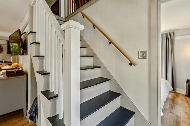 4780 Mountain Rd, Stowe, VT 05672 - stairway featuring wood finished floors