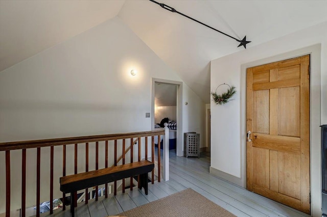 4780 Mountain Rd, Stowe, VT 05672 - stairs with lofted ceiling and wood finished floors