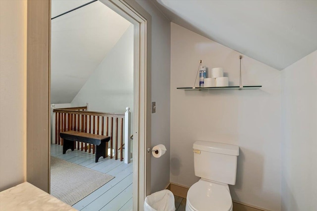 4780 Mountain Rd, Stowe, VT 05672 - bathroom featuring lofted ceiling and toilet