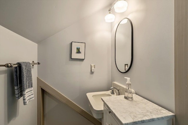 4780 Mountain Rd, Stowe, VT 05672 - bathroom with vaulted ceiling and vanity