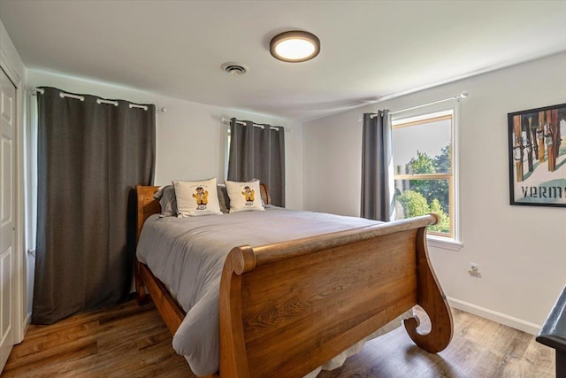 165 Golf Course Rd, Warren, VT 05674 - bedroom featuring wood finished floors and baseboards