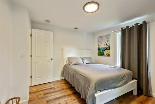 165 Golf Course Rd, Warren, VT 05674 - bedroom featuring light wood finished floors and baseboards