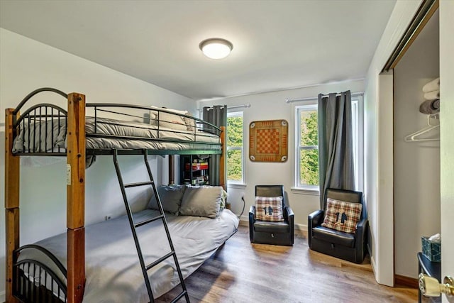 165 Golf Course Rd, Warren, VT 05674 - bedroom featuring wood finished floors and baseboards