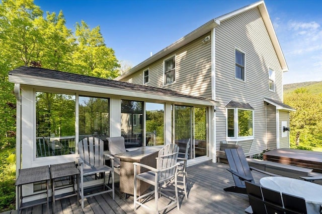 165 Golf Course Rd, Warren, VT 05674 - wooden terrace featuring a covered hot tub and a sunroom