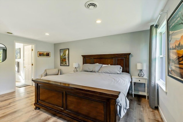165 Golf Course Rd, Warren, VT 05674 - bedroom with light wood-type flooring, baseboards, multiple windows, and recessed lighting