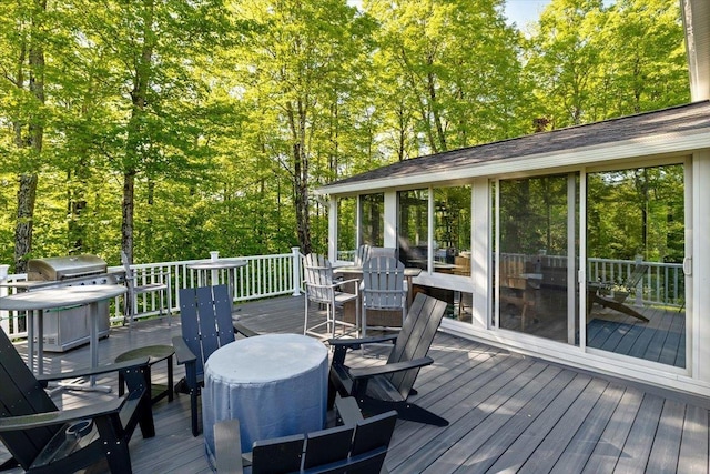 165 Golf Course Rd, Warren, VT 05674 - wooden terrace with a grill and outdoor dining space