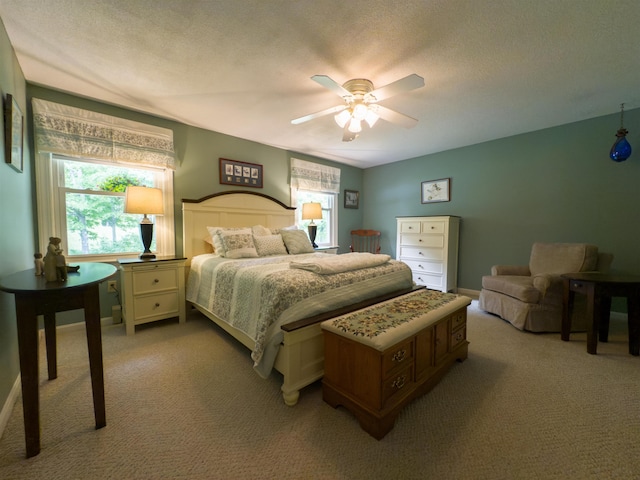 402 E Rd, Cornish, NH 03745 - bedroom with light carpet, multiple windows, a ceiling fan, and a textured ceiling