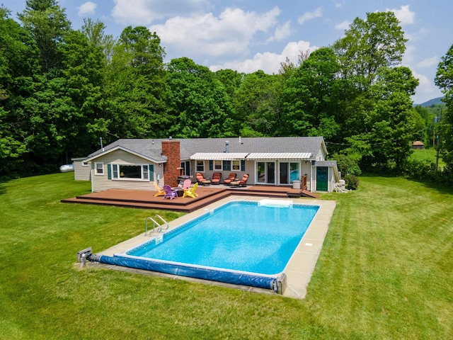 402 E Rd, Cornish, NH 03745 - rear view of property with a deck, a covered pool, a chimney, a lawn, and a forest view