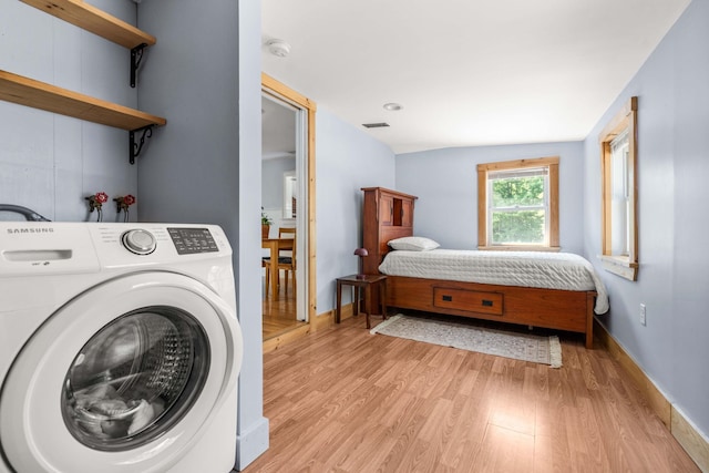 20 Circuit Dr, Kingston, NH 03848 - laundry room featuring washer / dryer, light wood-style floors, and baseboards