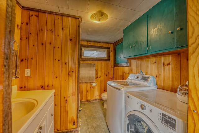 336 N Rd, Lancaster, NH 03584 - laundry area with independent washer and dryer, wooden walls, and light tile patterned flooring