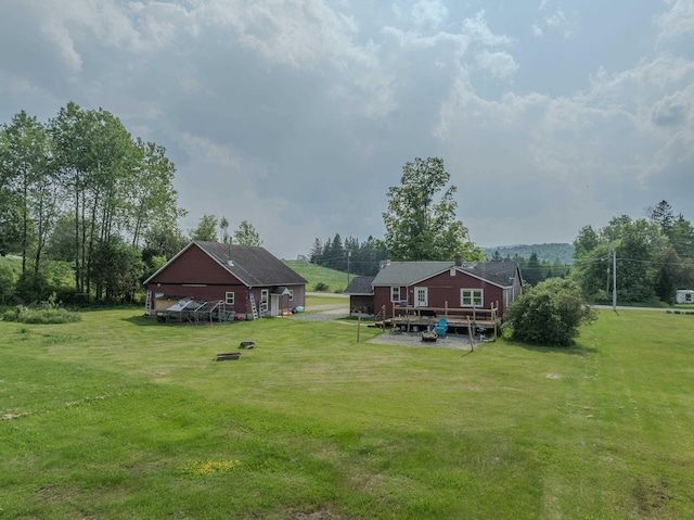 336 N Rd, Lancaster, NH 03584 - view of grassy yard with a wooden deck