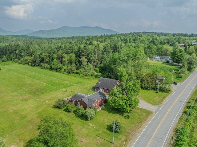 336 N Rd, Lancaster, NH 03584 - view from above of property featuring a heavily wooded area and a mountainous background