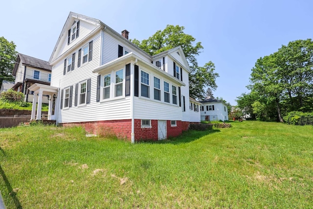 11 Linden St, Somersworth, NH 03878 - view of side of home with a chimney and a yard