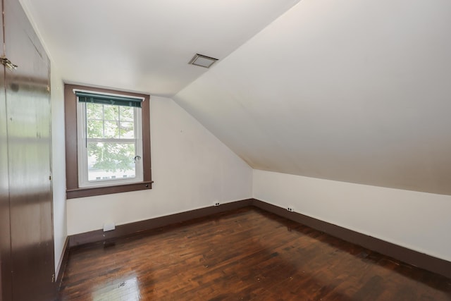11 Linden St, Somersworth, NH 03878 - bonus room featuring dark wood-style floors, lofted ceiling, and baseboards