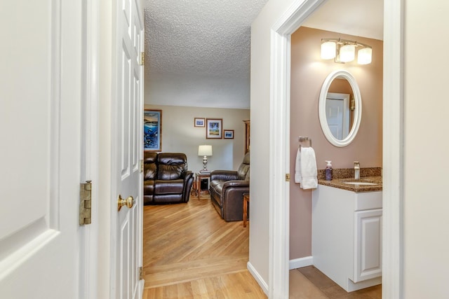 50 Kienia Rd, Hudson, NH 03051 - hall with a sink and parquet flooring