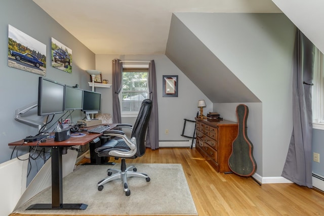 50 Kienia Rd, Hudson, NH 03051 - office space with light wood-style floors, a baseboard radiator, lofted ceiling, and baseboards