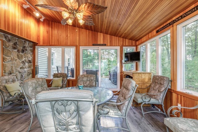 50 Kienia Rd, Hudson, NH 03051 - sunroom / solarium featuring vaulted ceiling, wooden ceiling, wooden walls, wood finished floors, and a deck