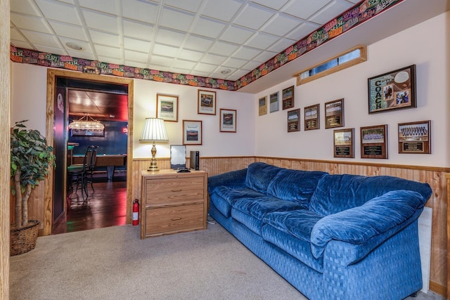 50 Kienia Rd, Hudson, NH 03051 - living area with a wainscoted wall, carpet flooring, and wooden walls