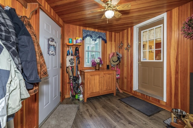 50 Kienia Rd, Hudson, NH 03051 - entryway with wood walls, ceiling fan, dark wood-type flooring, and wooden ceiling