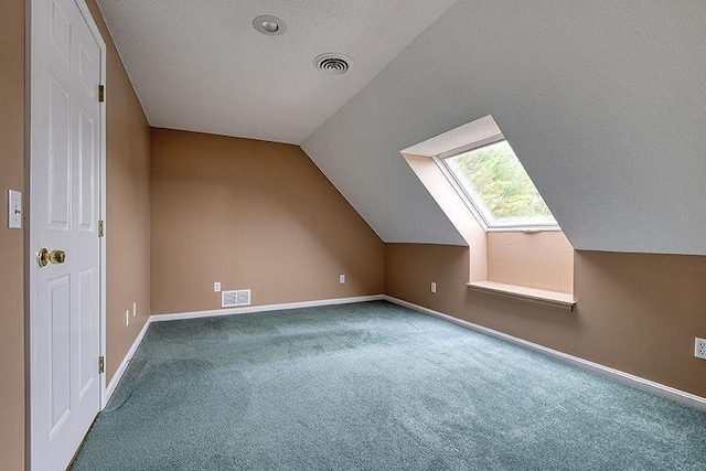 1 Wesley Ln, Keene, NH 03431 - bonus room with carpet flooring, baseboards, vaulted ceiling, a textured ceiling, and a skylight