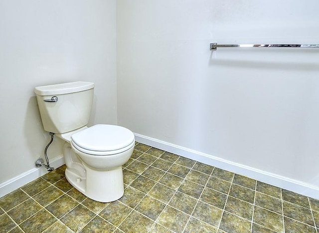 1 Wesley Ln, Keene, NH 03431 - half bathroom with toilet, baseboards, and tile patterned floors