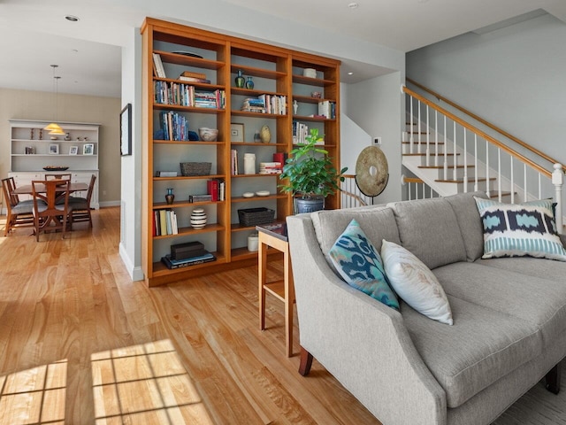 200 Lake St Unit 16, Burlington, VT 05401 - sitting room featuring light wood-style floors, stairs, and baseboards
