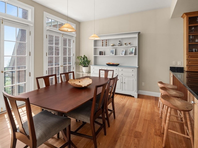 200 Lake St Unit 16, Burlington, VT 05401 - dining room with light wood-style floors and baseboards