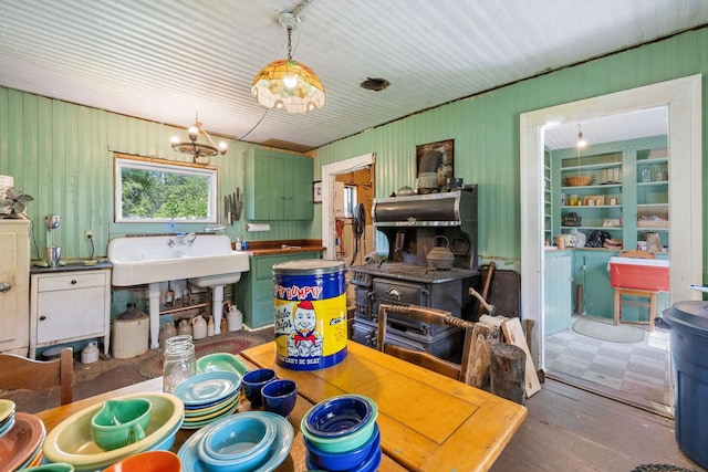 9 Laurel St, Whitefield, NH 03598 - dining area with hardwood / wood-style flooring and wood walls