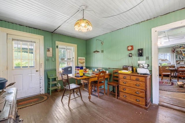 9 Laurel St, Whitefield, NH 03598 - dining space featuring wood-type flooring, healthy amount of natural light, and wood walls