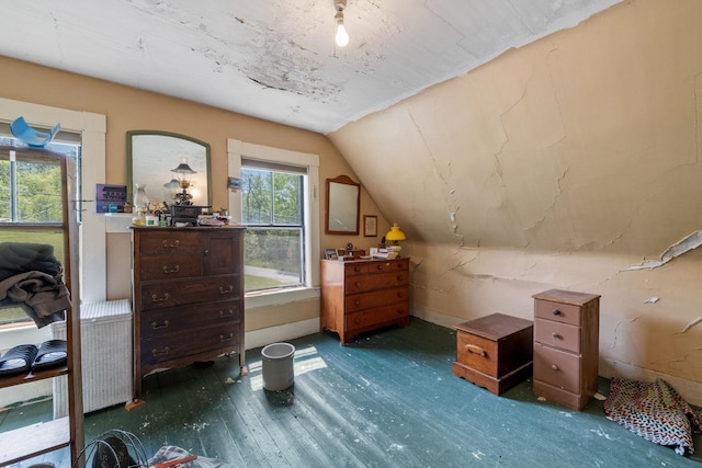 9 Laurel St, Whitefield, NH 03598 - bedroom featuring wood finished floors and vaulted ceiling