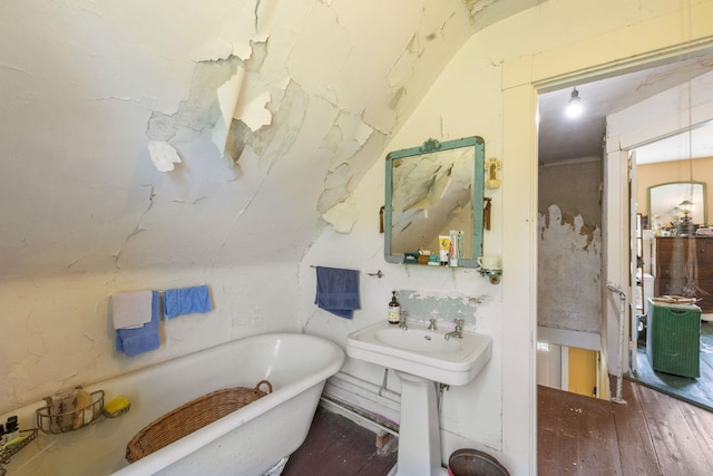 9 Laurel St, Whitefield, NH 03598 - full bathroom featuring a soaking tub and hardwood / wood-style flooring