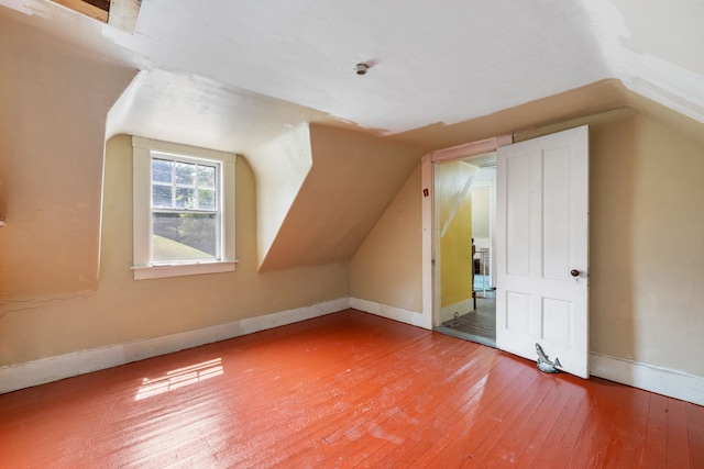 9 Laurel St, Whitefield, NH 03598 - bonus room with hardwood / wood-style flooring, lofted ceiling, and baseboards