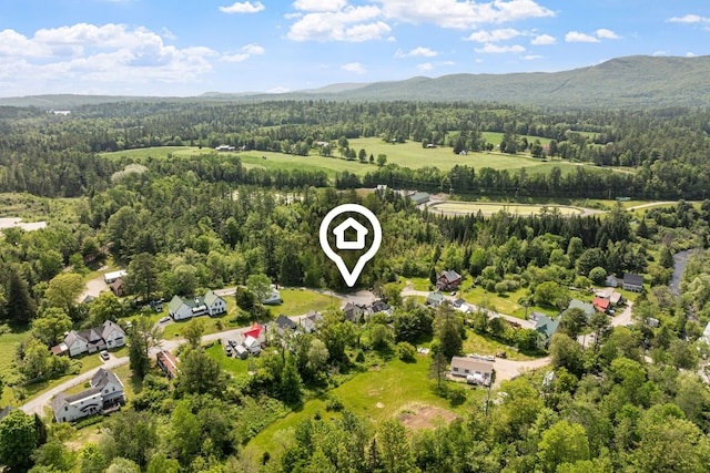 9 Laurel St, Whitefield, NH 03598 - bird's eye view of a heavily wooded area and a mountainous background