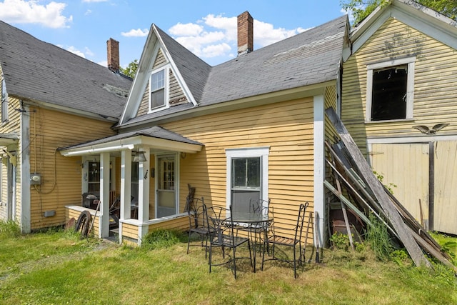 9 Laurel St, Whitefield, NH 03598 - back of house featuring a chimney and a yard