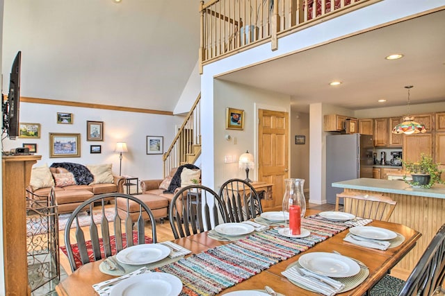105 Valley View Rd, Easton, NH 03580 - dining space with stairway, a towering ceiling, baseboards, and recessed lighting