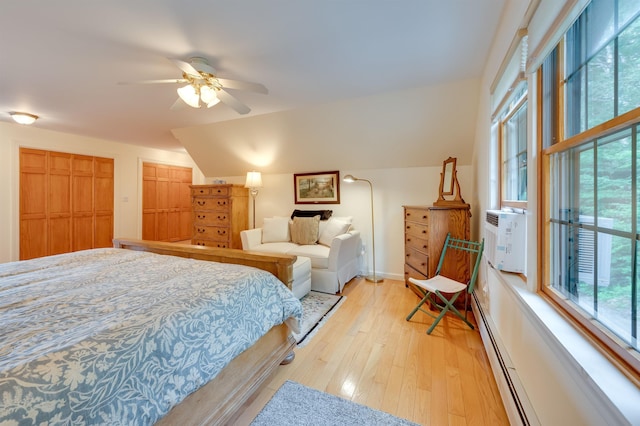 105 Valley View Rd, Easton, NH 03580 - bedroom with light wood-style flooring, vaulted ceiling, ceiling fan, and baseboards