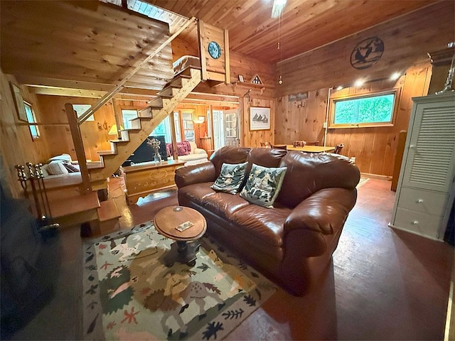 422/431 Little Rutland Rd, Castleton, VT 05735 - living area with wooden ceiling, wood walls, stairs, and wood finished floors